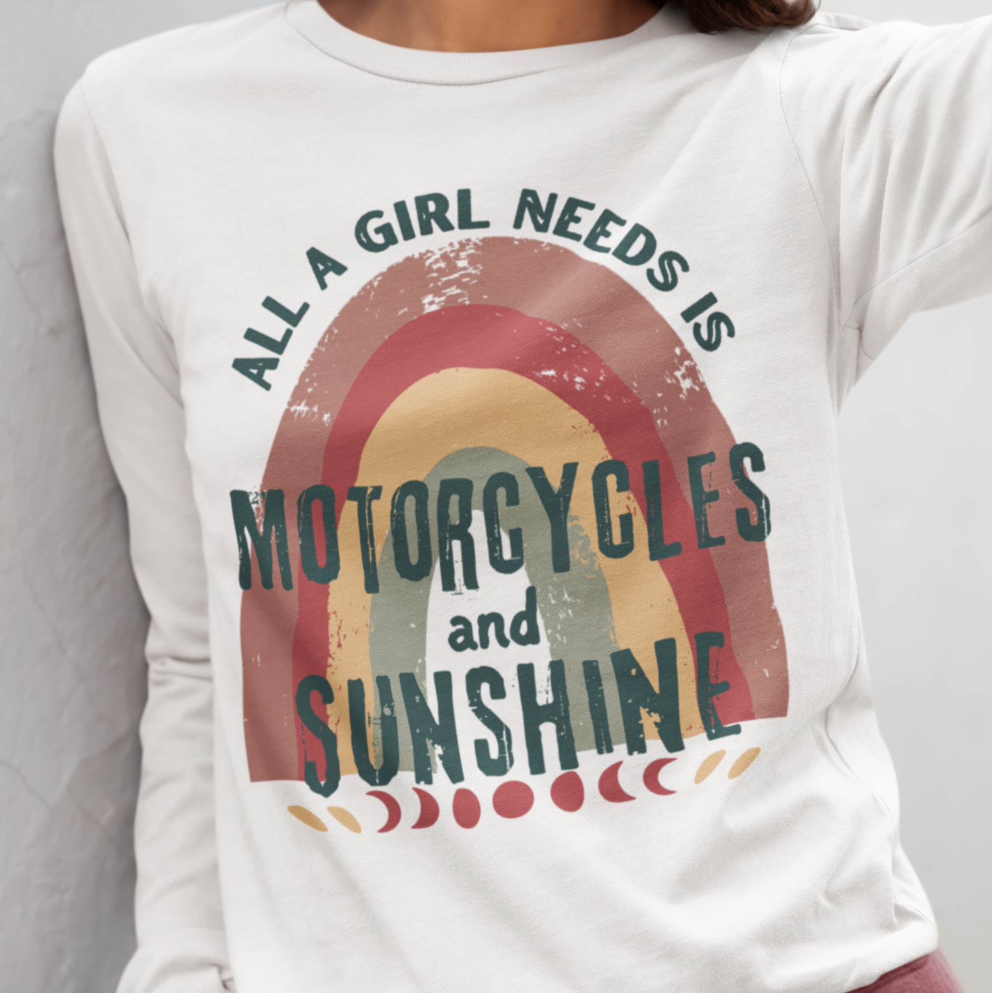 White sweatshirt with a graphic design featuring a rainbow and text on a gray background