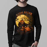 Person wearing a black long-sleeve shirt with a Halloween-themed design on a gray background