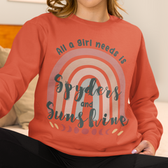 Person wearing a red sweatshirt with a rainbow design and text.