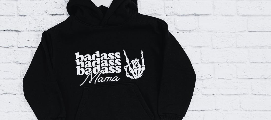 Hooded sweatshirt with phrases Baddass Mama and skull hands