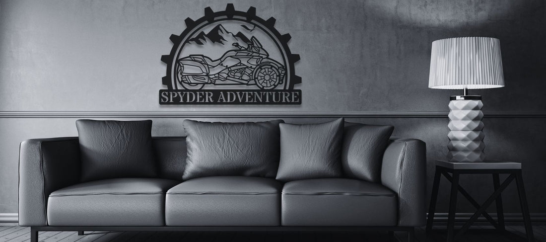 image of steel art piece of Can-Am Spyder design hung on wall behind leather sofa.