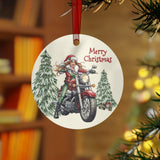 Christmas ornament with a design of a person on a motorcycle and trees, hanging from a tree.