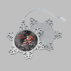 Snowflake-shaped Christmas ornament with Santa Claus on a motorcycle and 'Merry Christmas' text.