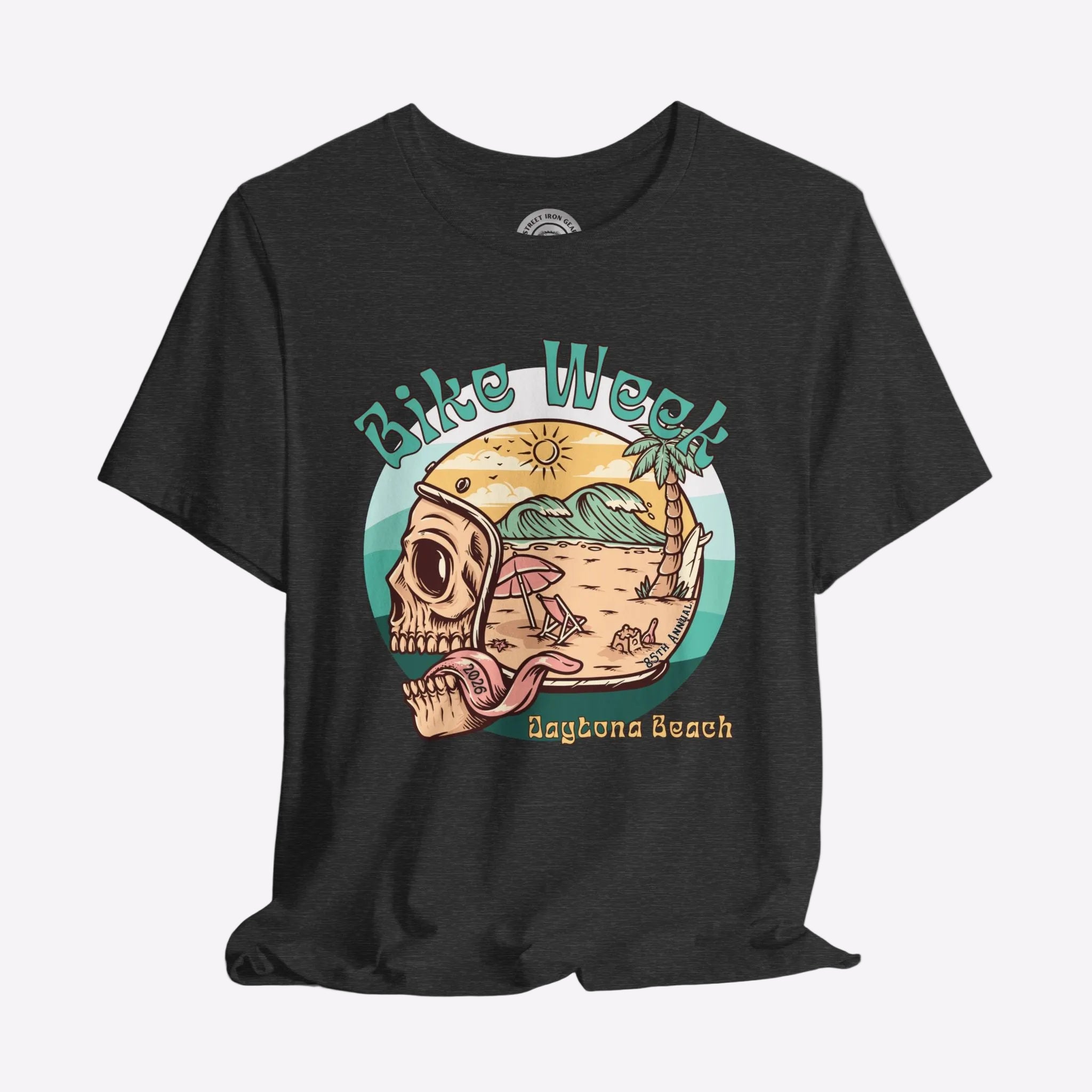 Black t-shirt with a graphic design of a skull, beach scene, and 'Bike Week Daytona Beach' text on a gray background.