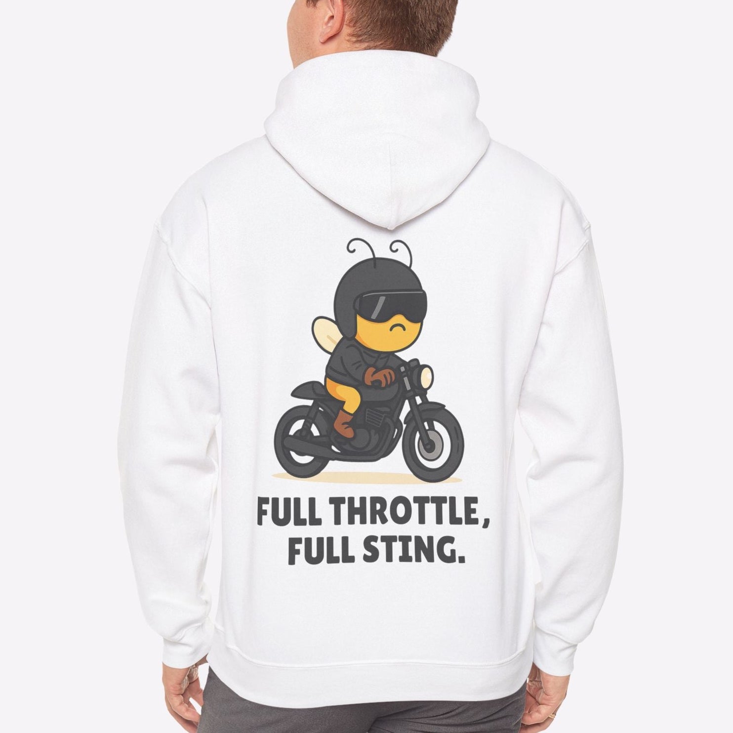 Person wearing a white hoodie with a graphic design on the back, standing against a white background.