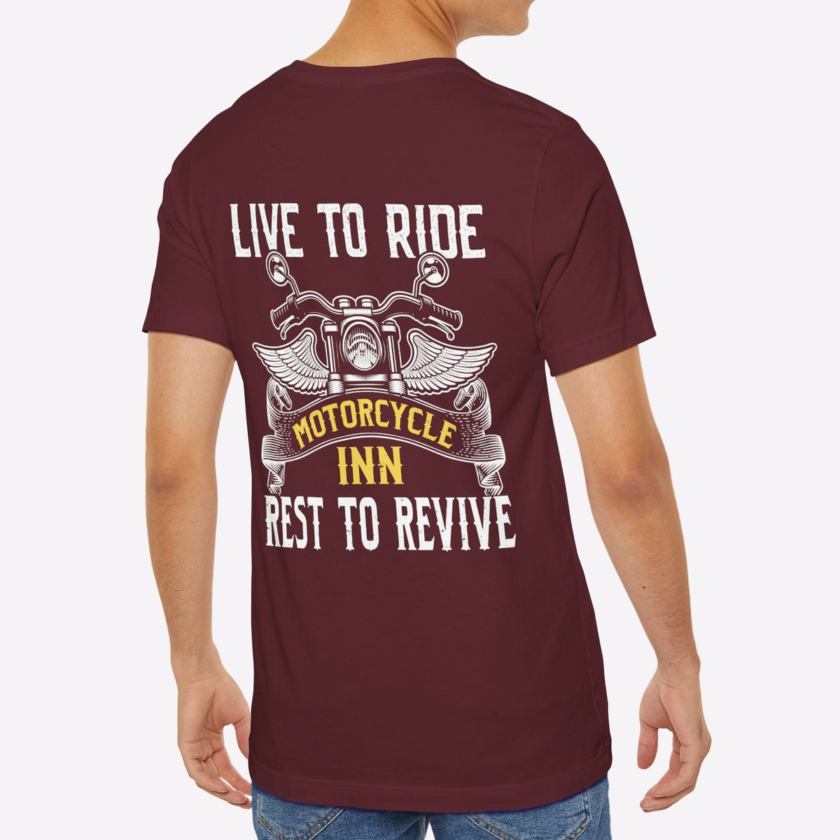 Man wearing a maroon t-shirt with motorcycle-themed text on the back