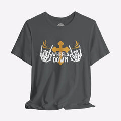 A black crew neck t-shirt with a graphic print of skeleton hands, a gold cross, and the text 'Wheels Down'.