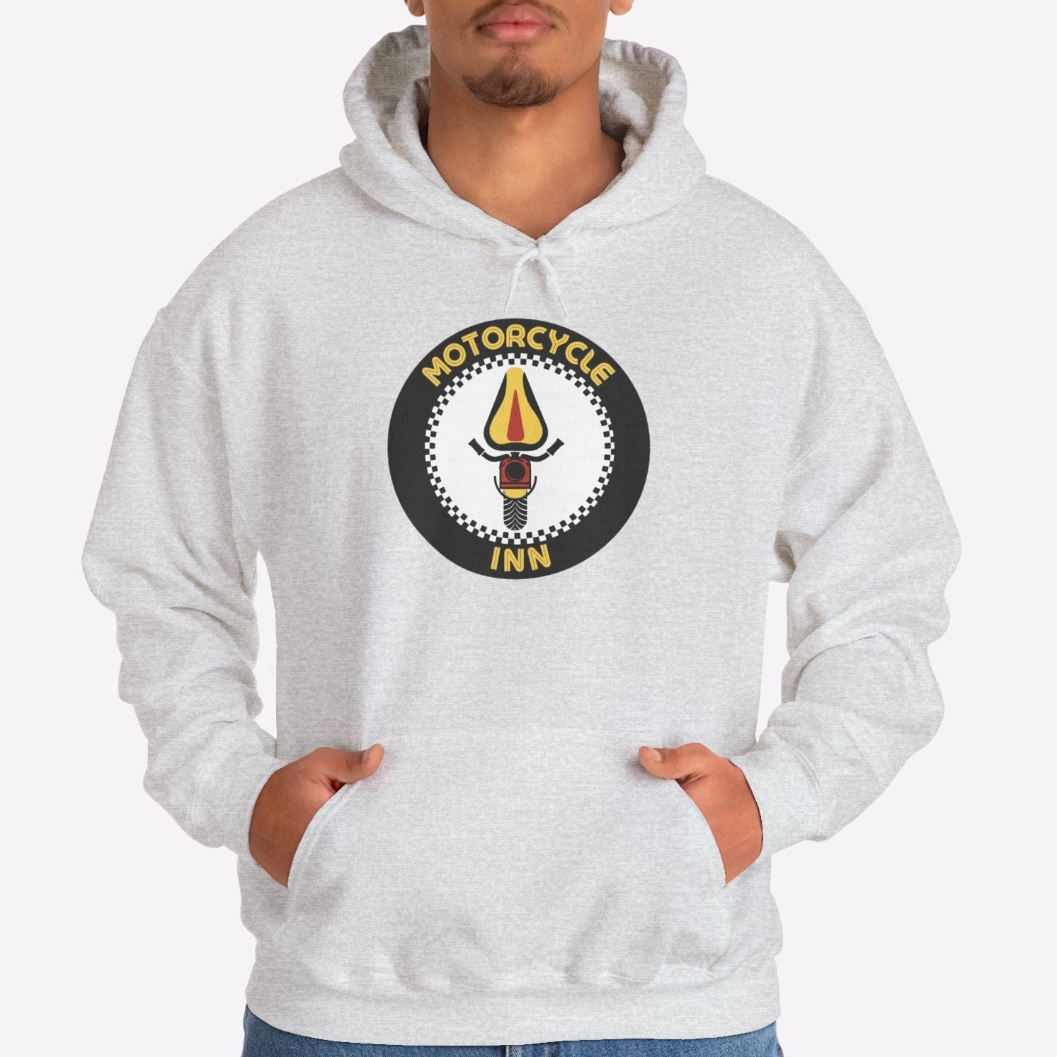 Person wearing a white hoodie with a logo on a white background