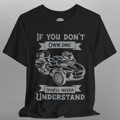 Black t-shirt with graphic of a go-kart and text on a gray background