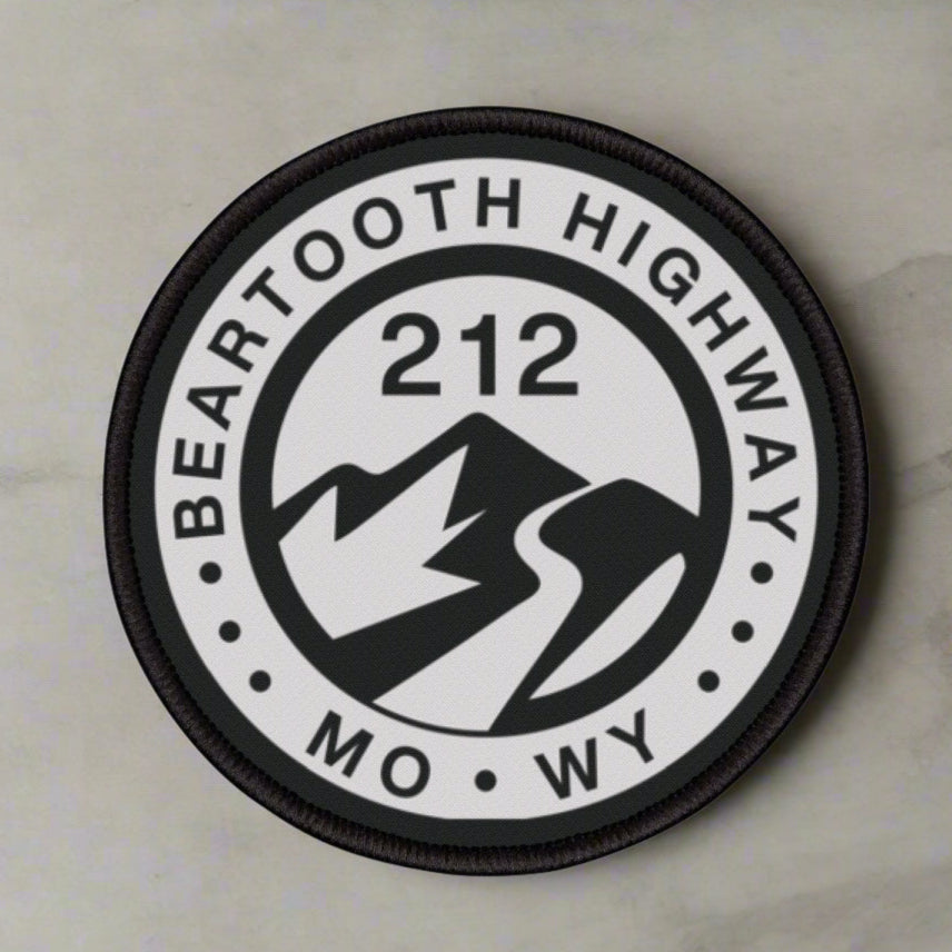 Round patch with 'Beartooth Highway 212 MO WY' text and mountain design on a white background
