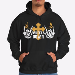 Person wearing a black hoodie with a graphic design on a white background