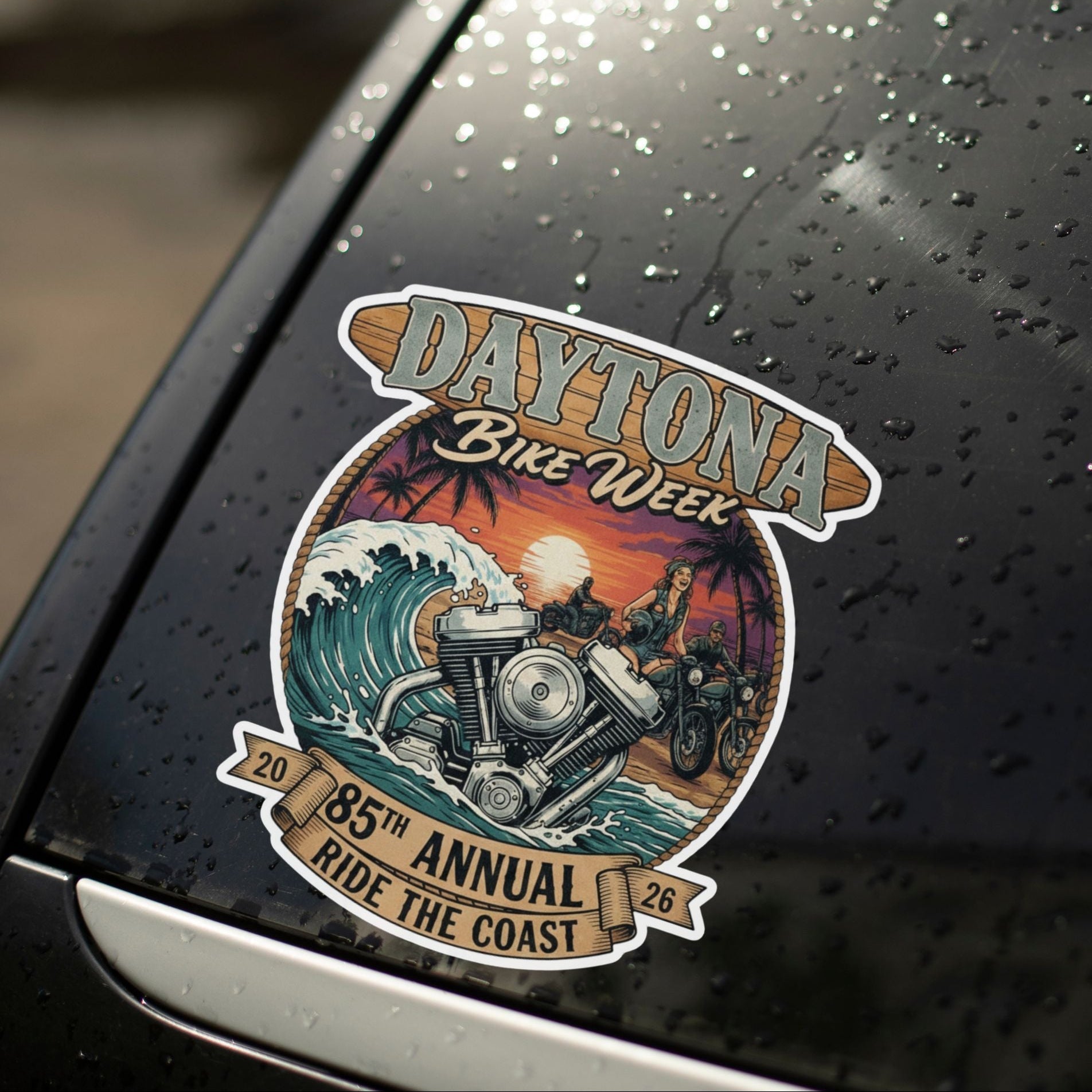 Daytona Bike Week sticker on a car window with raindrops.