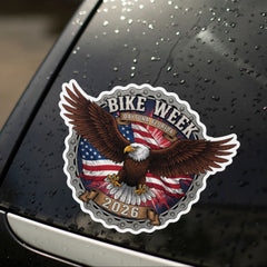 Bike Week 2026 sticker with an eagle and American flag on a wet car window.