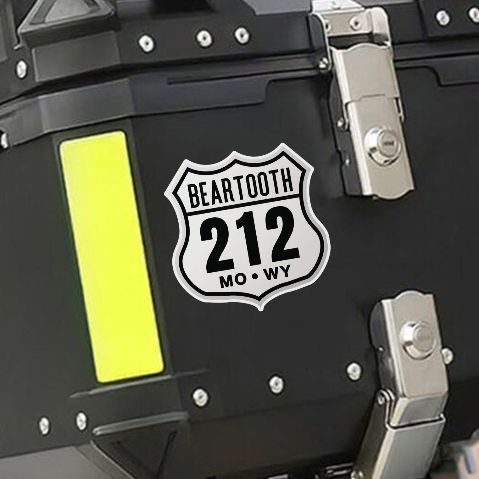 Black storage box with 'Beartooth 212' logo on a motorcycle