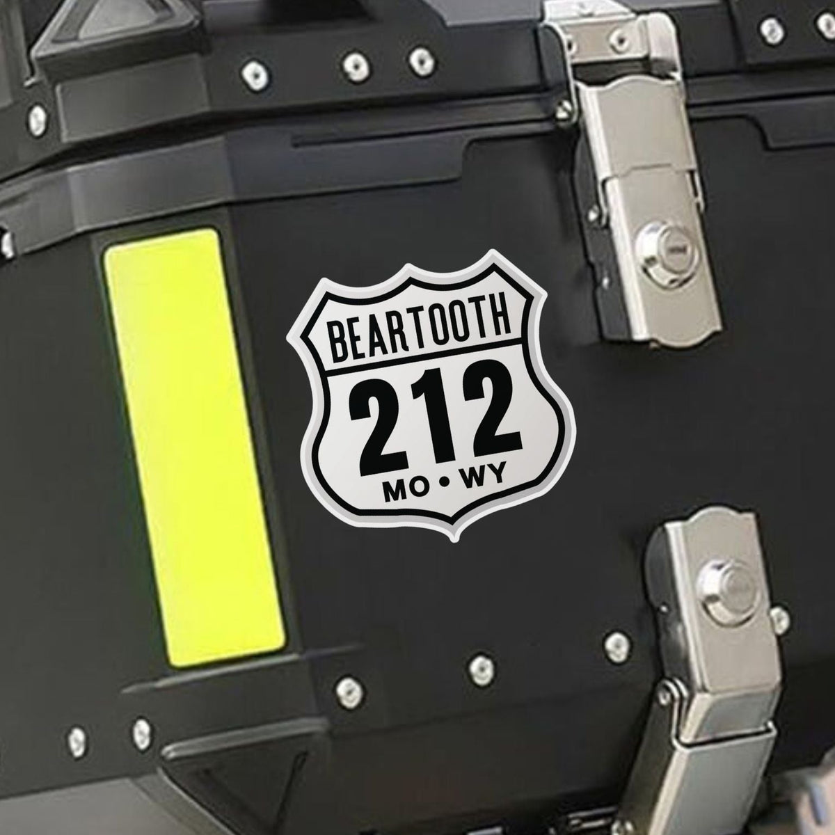 Black storage box with 'Beartooth 212' logo on a motorcycle
