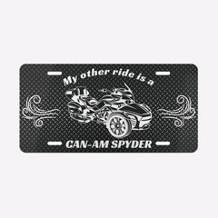 License plate with a graphic of a Can-Am Spyder and text on a black background